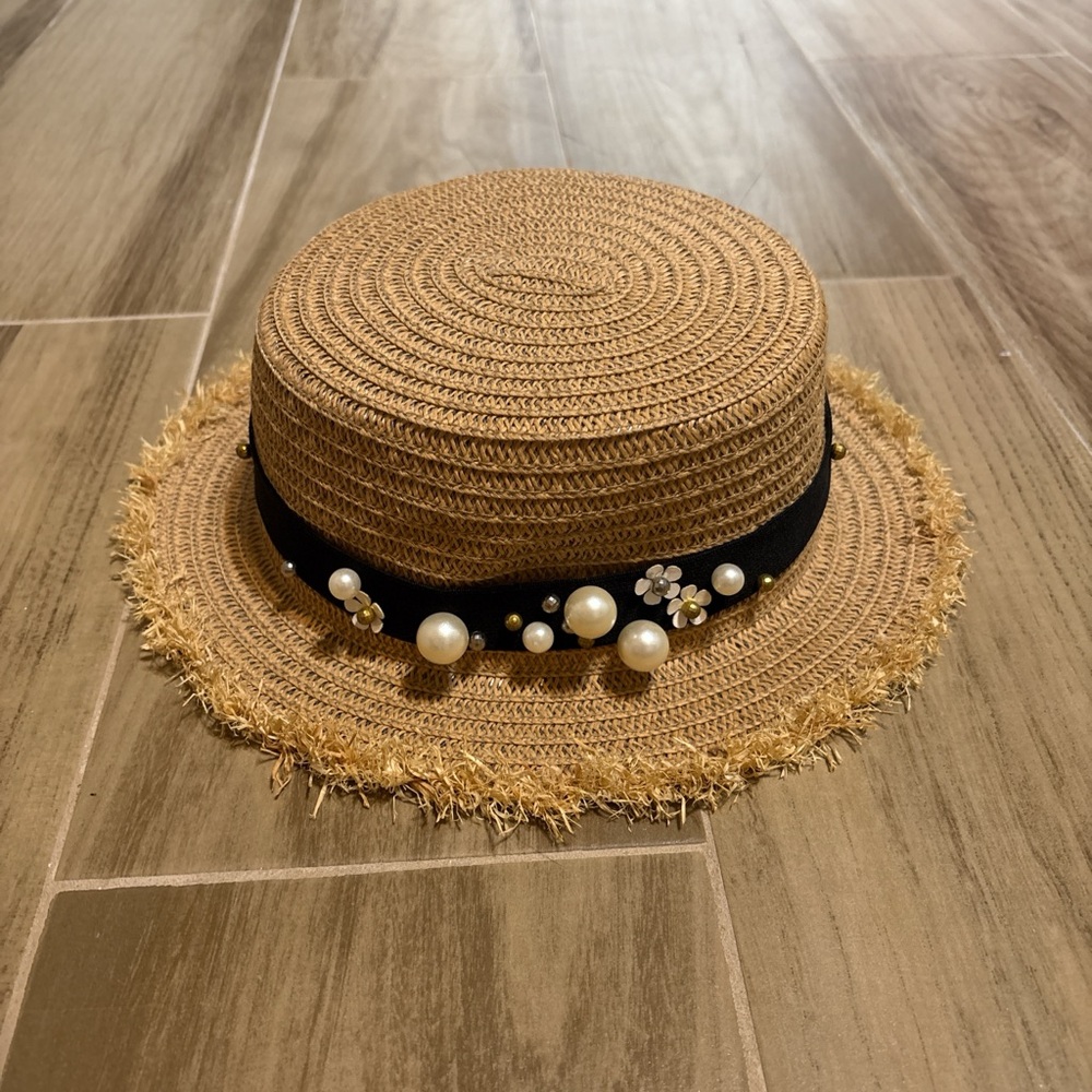 Stylish Straw Hat with Pearl Embellishments